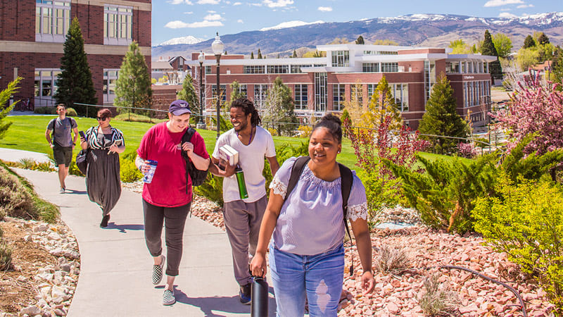 College kids walking through campus